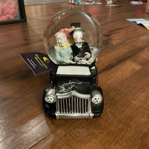 Moonlight manor skeleton Halloween musical snow globe